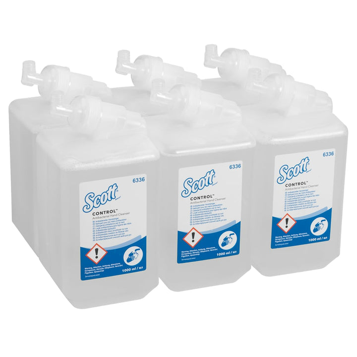 A Stack of Six Clear, White and Blue 6336 Scott Control Hand Sanitiser Refills