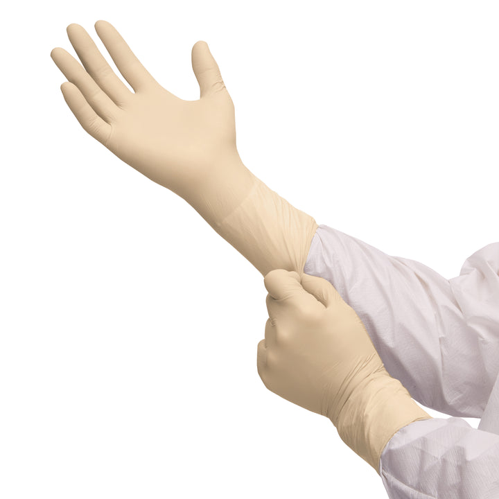 A Person Wearing a White Coverall Donning a Pair of Tan Coloured 56843 Latex Gloves