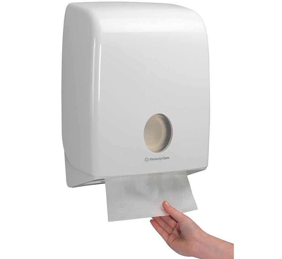 A Person Using a White Paper 6954 AQUARIUS* Folded Hand Towel Dispenser, C Fold - White - Sentinel Laboratories Ltd