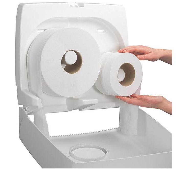 A Person Using a White 6991 AQUARIUS* Toilet Tissue Dispenser, Midi Jumbo Non-Stop - White - Sentinel Laboratories Ltd