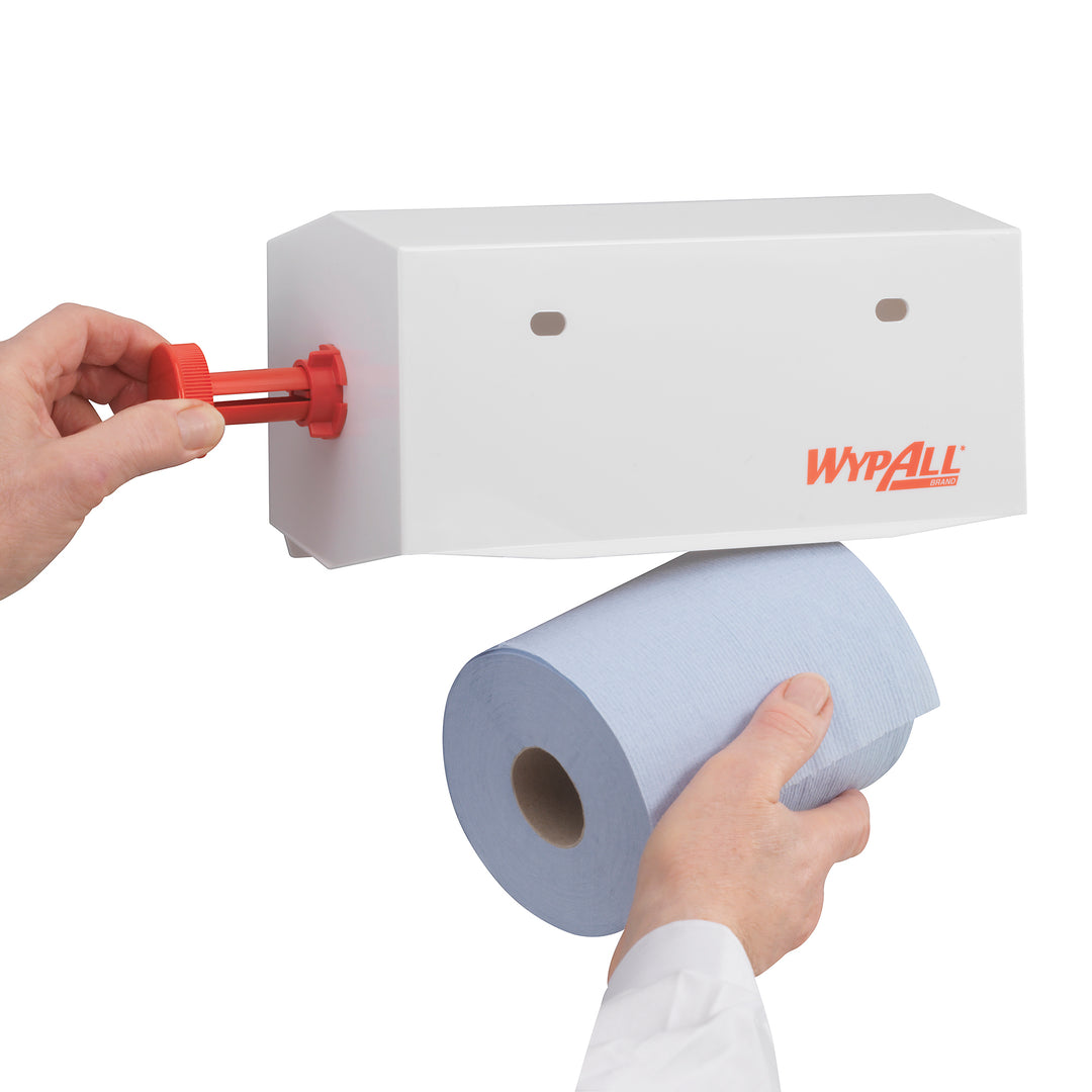 A Person Changing the Blue Paper Roll In a White 7041 KIMBERLY-CLARK PROFESSIONAL* 25cm Roll Towel Dispenser, Plastic - White - Sentinel Laboratories Ltd