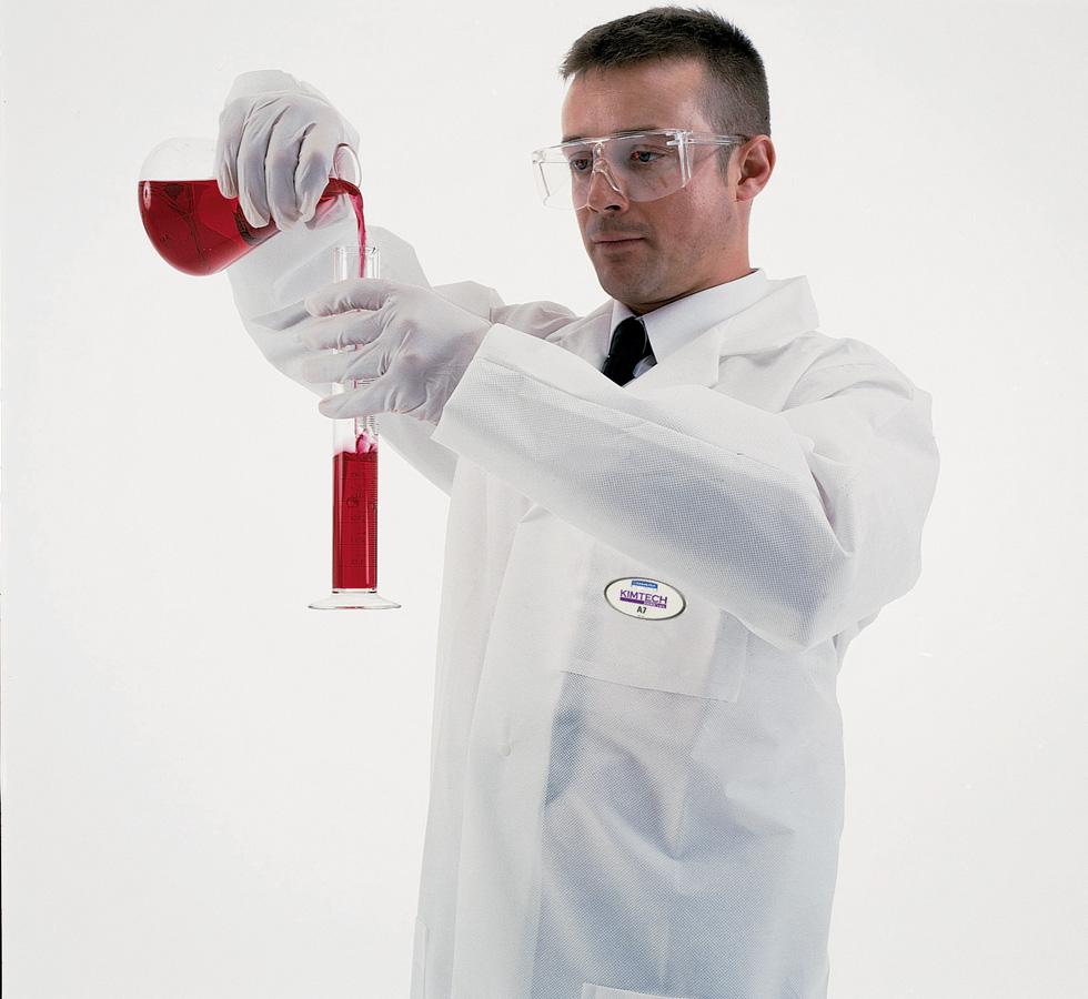 Man Wearing White KIMTECH SCIENCE* A7 Lab Coat Pouring Red Liquid from Vial - Sentinel Laboratories Ltd