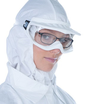 A Woman In a White Hooded Coverall Wearing Black Glasses Under White BioClean™ Clearview Autoclavable Goggles