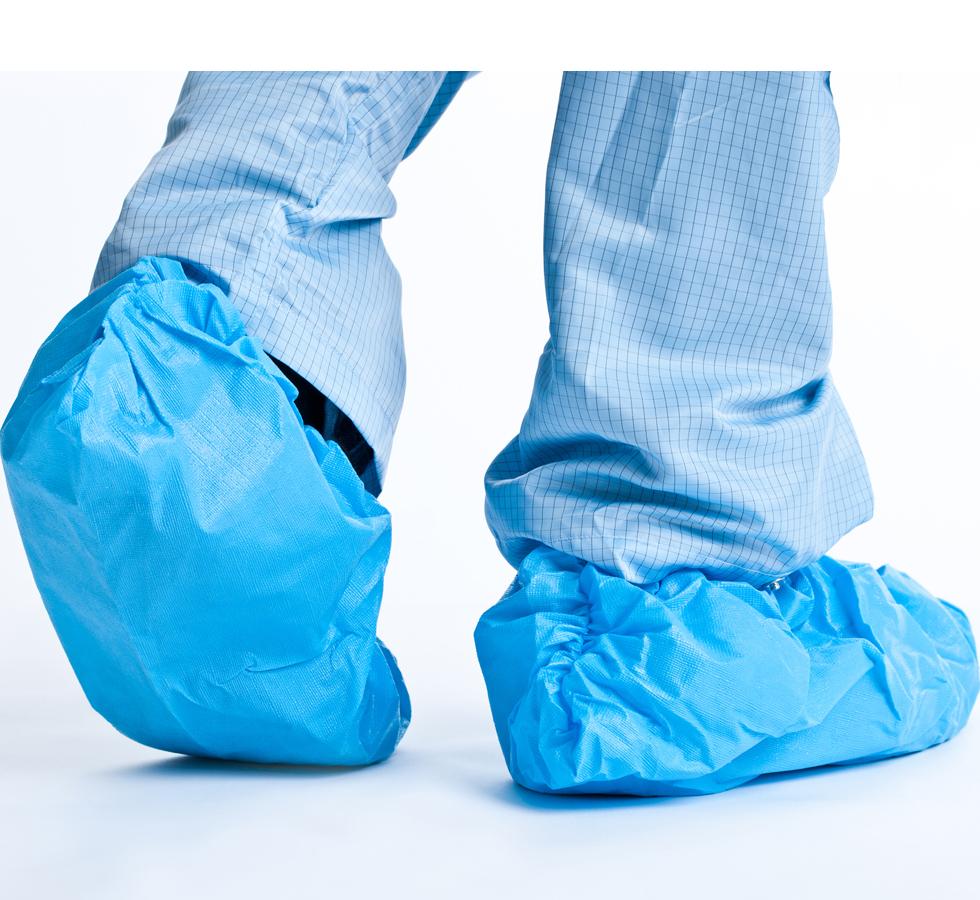 Person wearing Blue BioClean Durableu™ Disposable Overshoes with Blue Overtrousers - Sentinel Laboratories Ltd