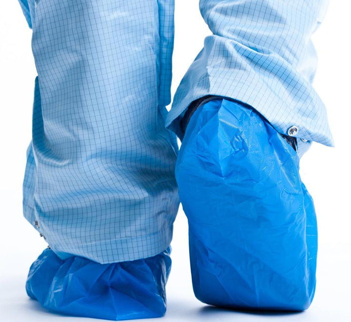 Person wearing BioClean™ CPE Disposable Overshoes with Blue Ovetrousers - Sentinel Laboratories Ltd