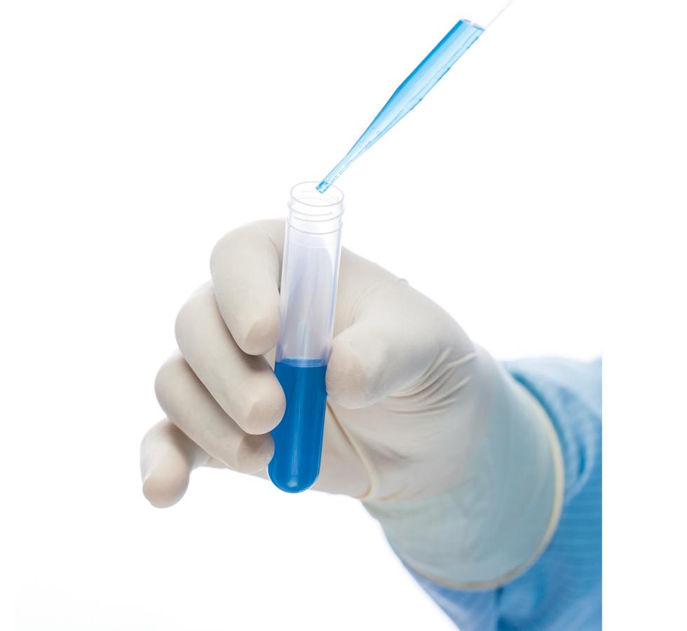 A Person Wearing a Single White Long Length Cuff BioClean P-Zero™ Sterile 300mm Length Polychloroprene Glove Dispensing a Blue Liquid from a Pipette into a Small Vial - Sentinel Laboratories Ltd