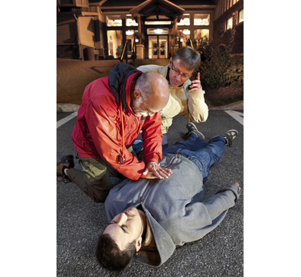 Man performing chest compressions - HSE Emergency First Aid at Work - Sentinel Laboratories Ltd