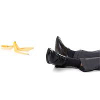A man's legs next to a banana peel - Health and Safety in the Workplace - Level 2 - Sentinel Laboratories Ltd