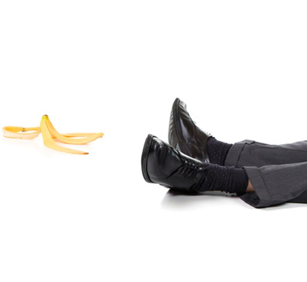 A man's legs next to a banana peel - Health and Safety in the Workplace - Level 4 - Sentinel Laboratories Ltd