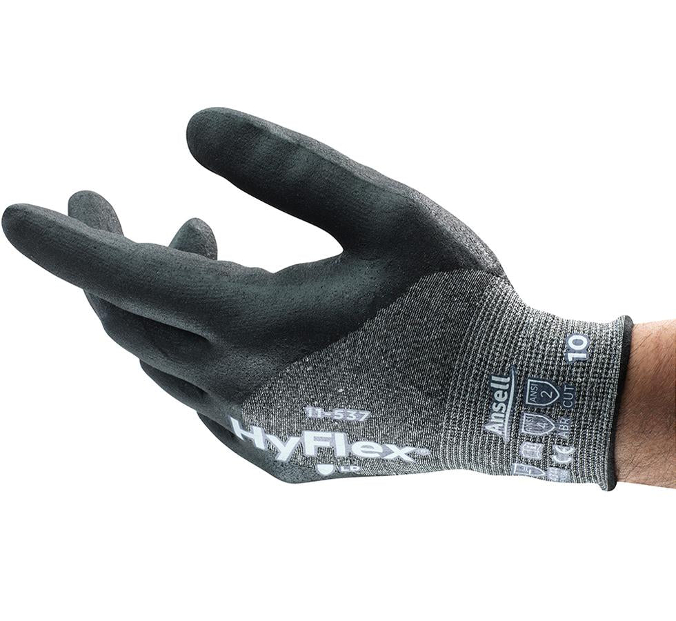 Man Wearing a Single Light and Dark Grey HYFLEX® 11-537 Industrial Glove - Sentinel Laboratories Ltd