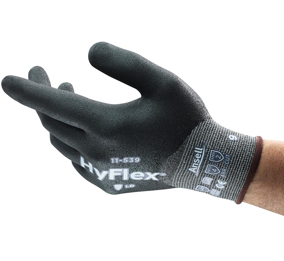 Man Wearing a Single Light and Dark Grey HYFLEX® 11-539 Glove - Brown Beaded, White Lettering - Sentinel Laboratories Ltd