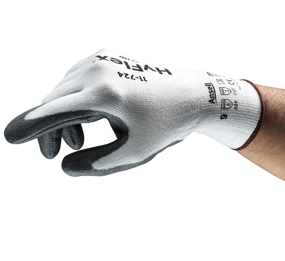 Man Wearing a Single White Outer, Dark Grey Palm/Finger Tip HYFLEX® 11-724 Glove - Black Lettering - Sentinel Laboratories Ltd