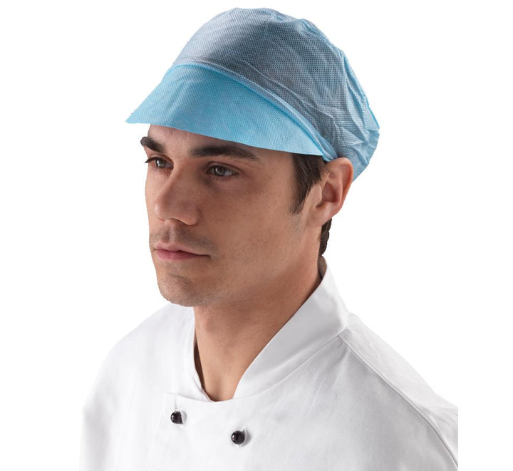 A Man Wearing a See-Through Blue Shield DM04 Peaked Cap Hair Net with a White Chef's Coat with Black Buttons - Sentinel Laboratories Ltd