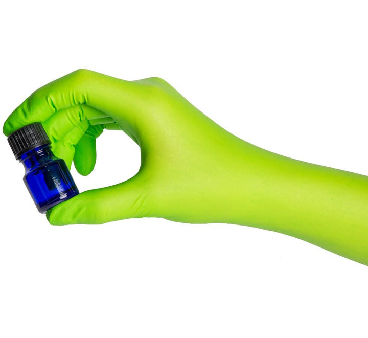 A Person Using Bright Green ecoSHIELD™ Eco Nitrile PF 250 Green Nitrile Gloves Holding a Small Blue and Black Vial - Sentinel Laboratories Ltd