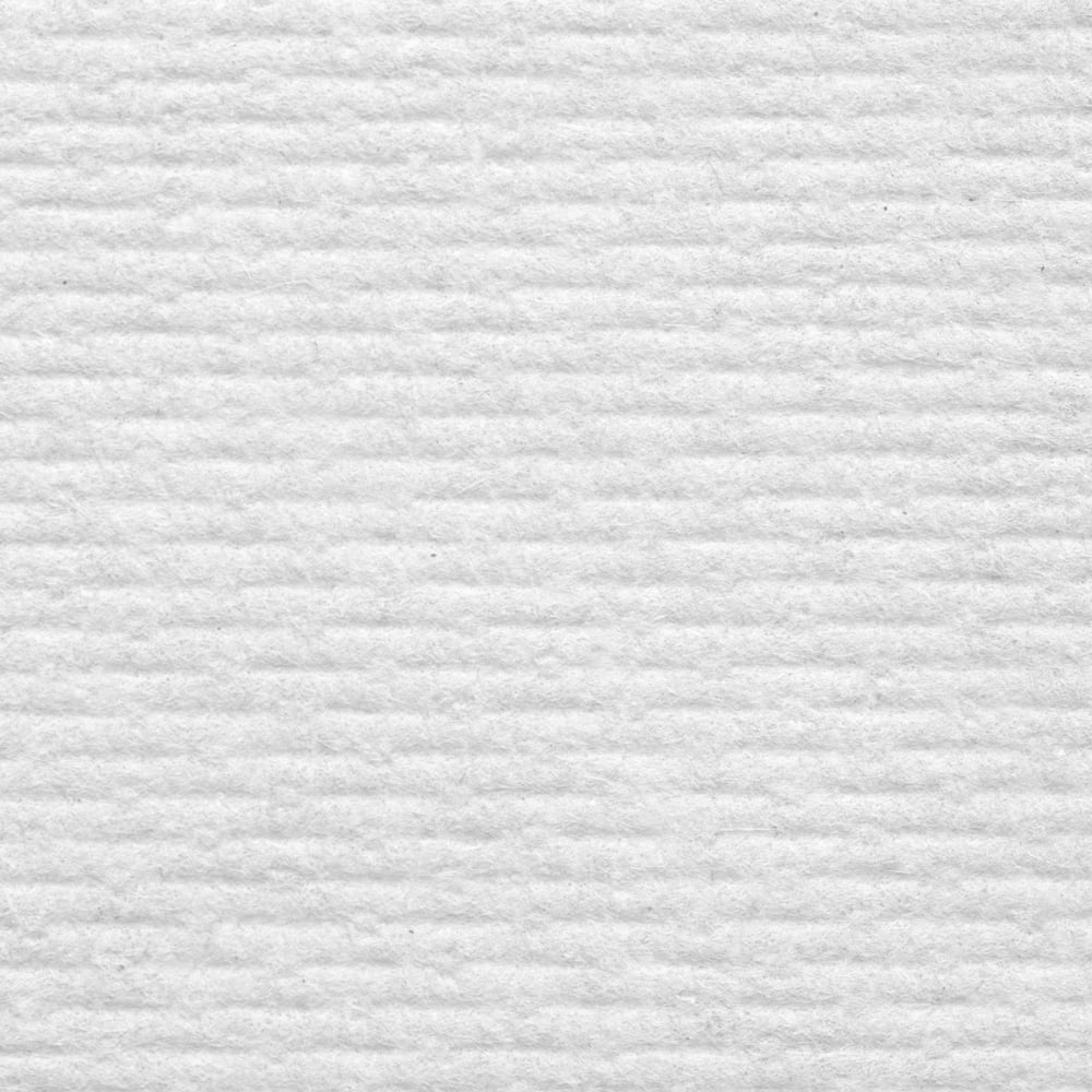 A Close Up View of a Single 7404 WypAll White Paper Hand Towel