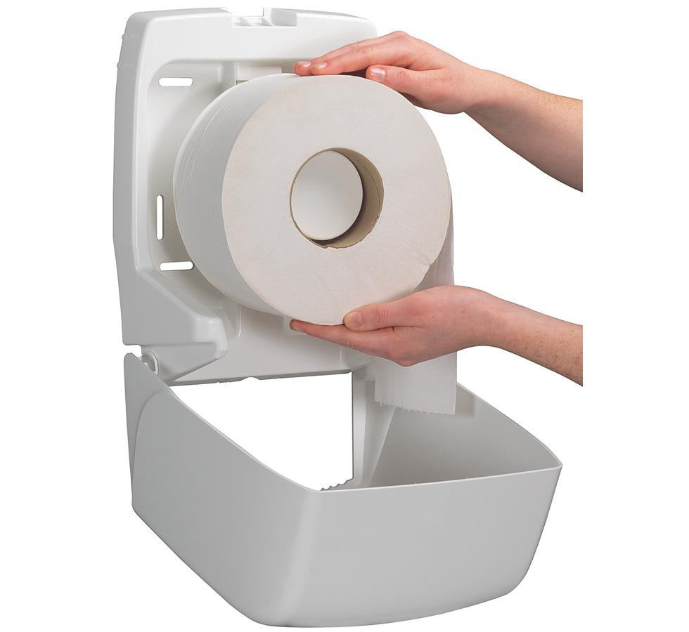 A Person Using a White 6958 AQUARIUS* Toilet Tissue Paper Dispenser, Mini Jumbo - White - Sentinel Laboratories Ltd