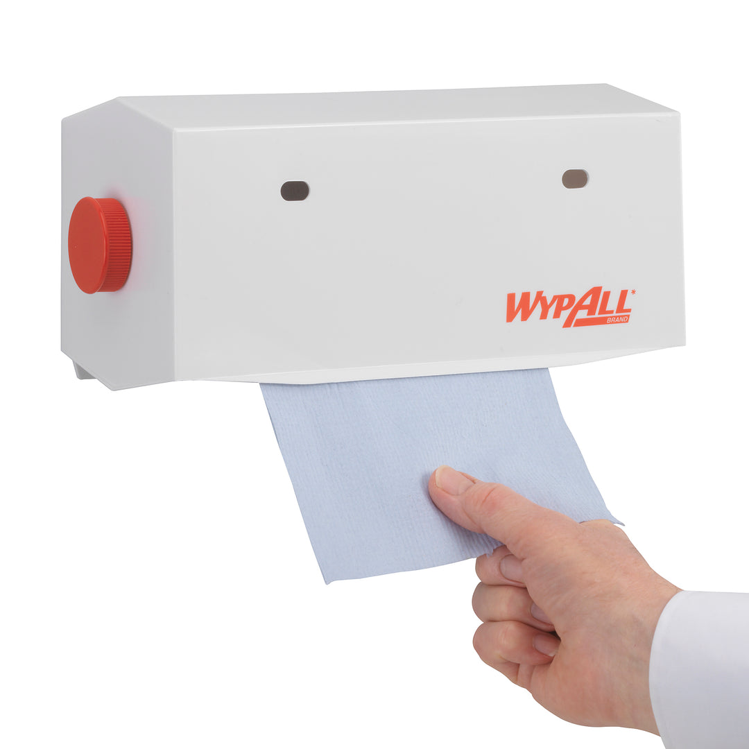 A Person Using a White and Red 7041 KIMBERLY-CLARK PROFESSIONAL* 25cm Roll Towel Dispenser, Plastic - White - Sentinel Laboratories Ltd