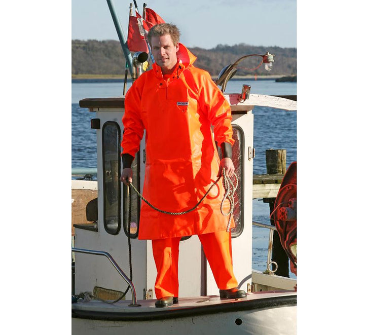 A Man Wearing a Fluorescent Orange Ocean Classic Trawl Frock Holding a Piece of Rope on a Boat - Sentinel Laboratories Ltd
