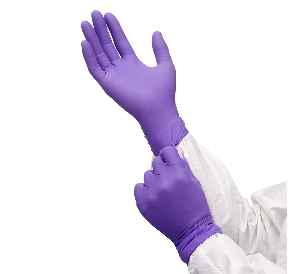A Person in a White Coverall Donning a Pair of 90625 Purple Nitrile Gloves