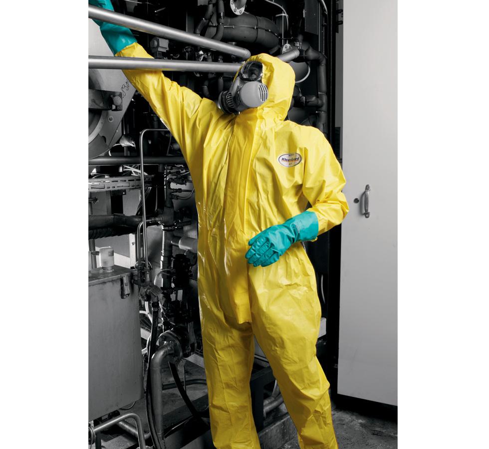 A Man Wearing a Yellow KLEENGUARD* A71 Chemical Spray Protection Hooded Coverall with Grey Full Face Respirator and Green Long Gloves - Sentinel Laboratories Ltd