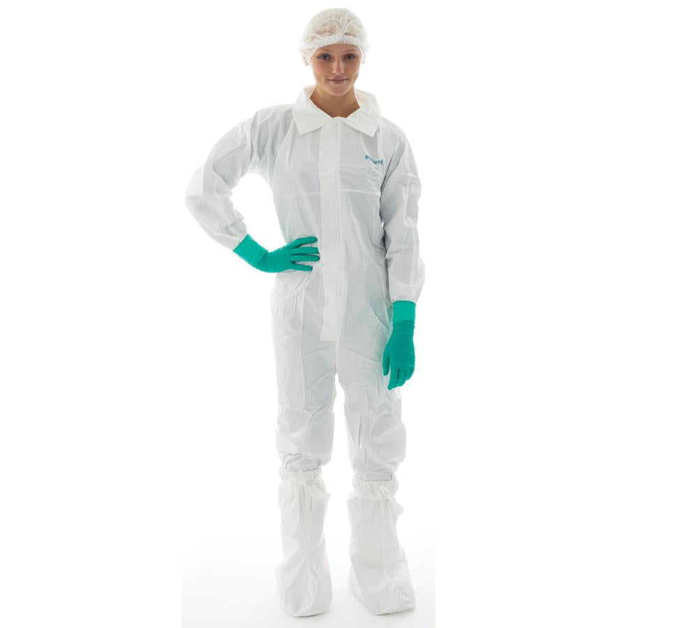 Woman wearing BioClean-D™ Sterile White Coverall with Collar and Green Gloves - Sentinel Laboratories Ltd