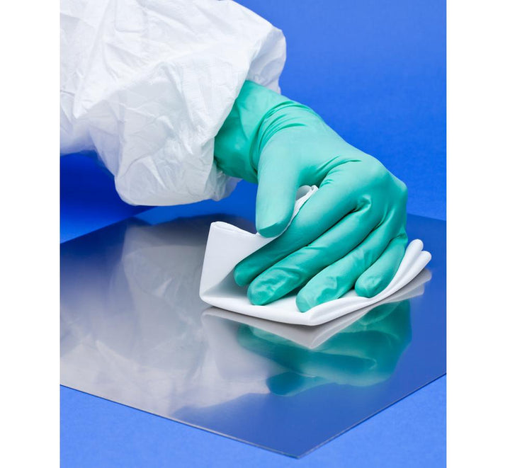Gloved Hand wiping Blue Surface Mat with White BioClean IsoPure Plus™  9" Wipes - Sentinel Laboratories Ltd