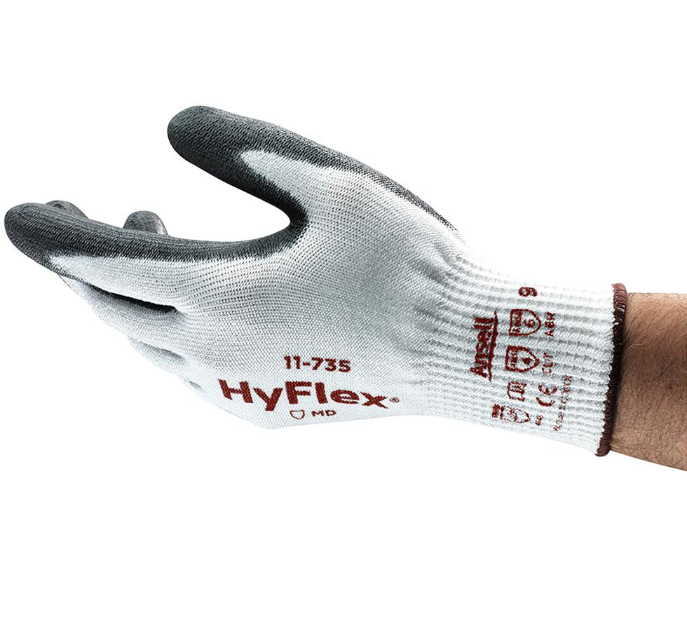 Man Wearing a Single White and Dark Grey HYFLEX® 11-735 Glove - Auburn Coloured Lettering - Sentinel Laboratories Ltd