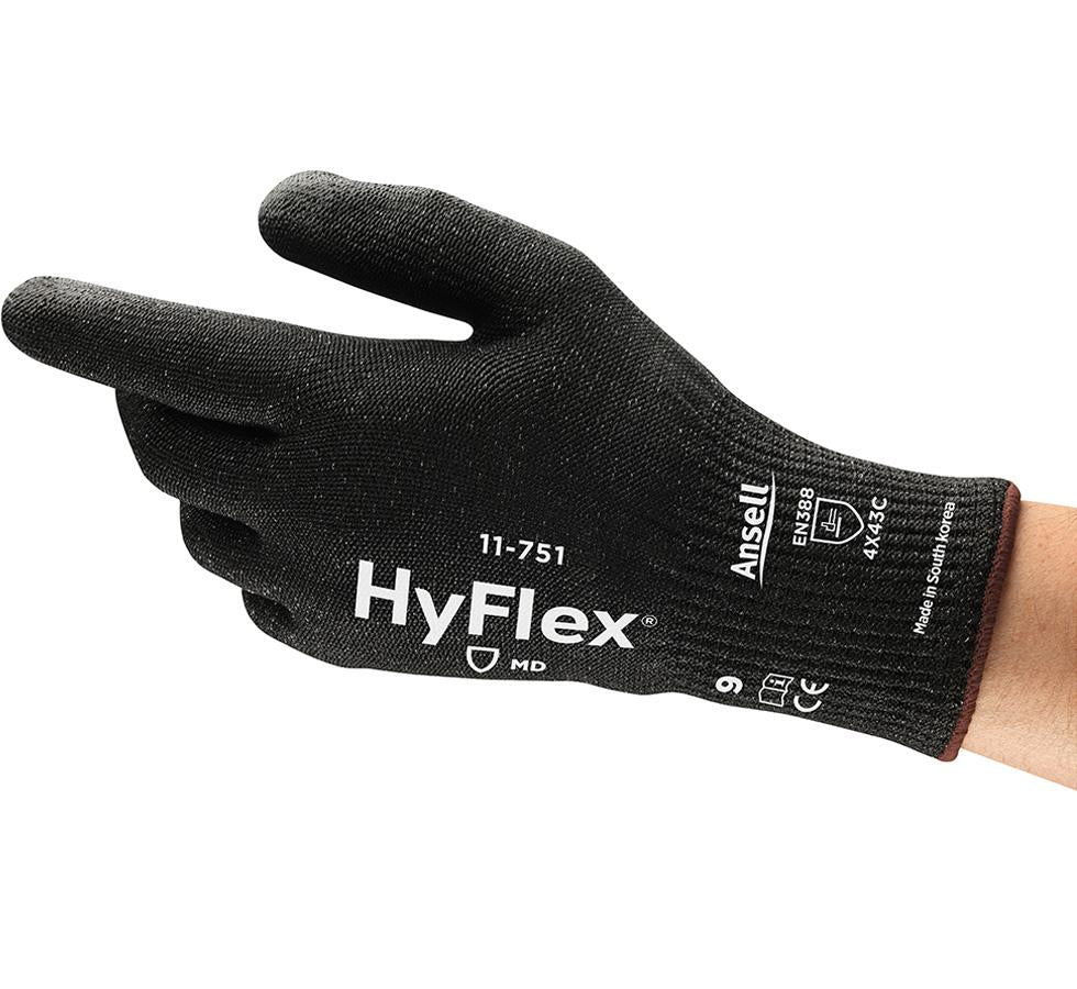 Person Wearing a Single Black HYFLEX® 11-751 Glove - Brown Beaded, White Lettering - Sentinel Laboratories Ltd