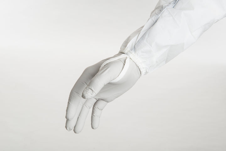 A Person Wearing a White KIMTECH* A5 Sterile Cleanroom Coverall over a White Glove - Sentinel Laboratories Ltd