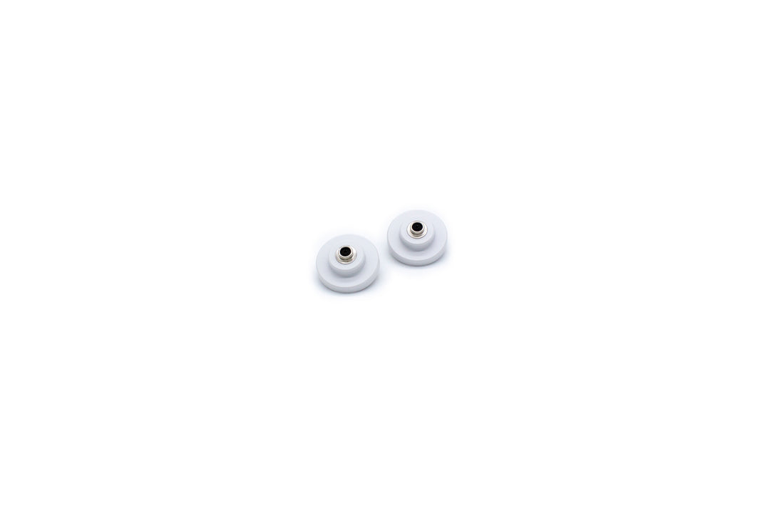 A Pair of White PureFlo PF3000-03-018 Hood Attachment Blanking Clips