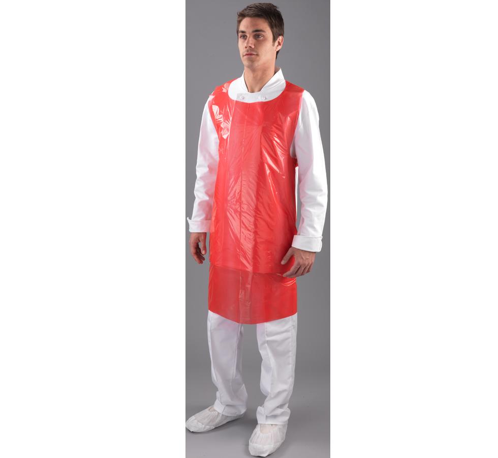 A Man Wearing a Red Shield 69 x 107cm Polythene Apron Over a White Coverall and Overshoes - Sentinel Laboratories Ltd