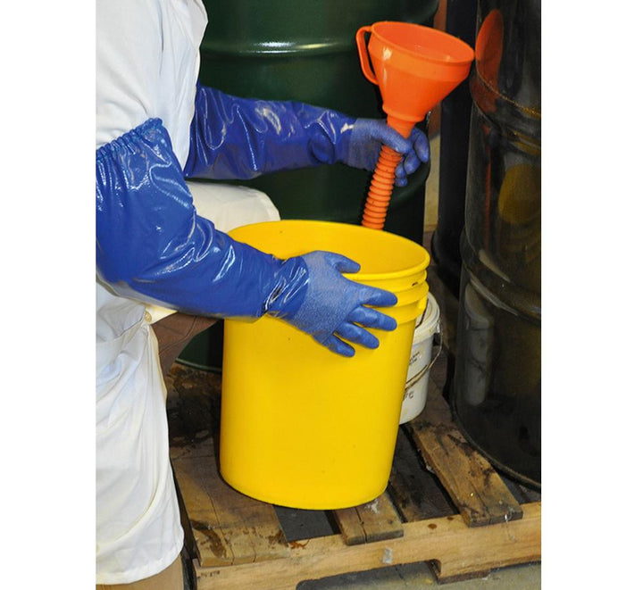 A Person Wearing a White Lab Coating Using a Pair of Navy Blue Showa Best NSK26 Nitrile Coated, Cotton Interlock Liner, 100% Nitrile Long Cuff Length Gloves Holding an Orange Funnel and Yellow Bucket - Sentinel Laboratories Ltd