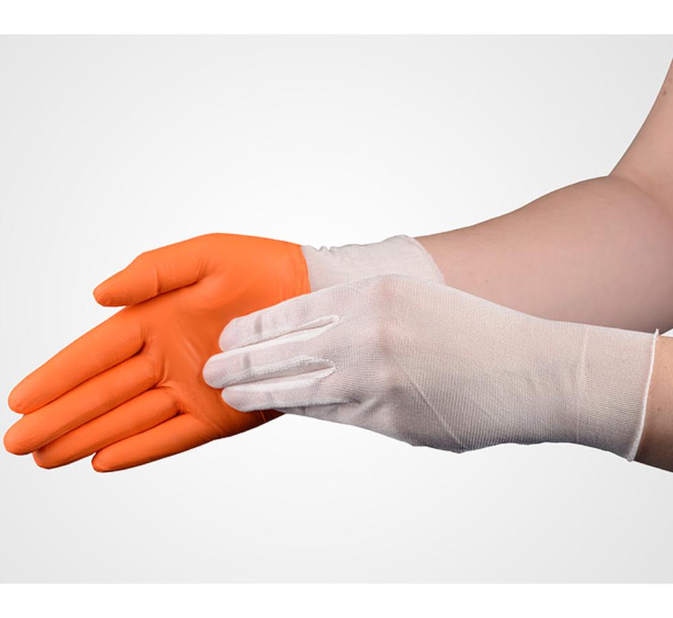 A Person Wearing a Pair of White SENSI-TOUCH® Silk Glove Liners, Long Length Donning an Orange Glove - Sentinel Laboratories Ltd