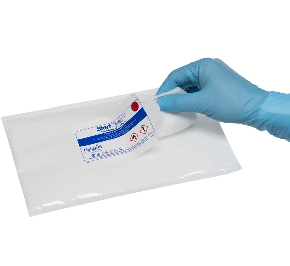 A Person with a Blue Gloved Hand Pulling a White SteriClean® IPA FloWrap Wipe from a Blue and White Pack - Sentinel Laboratories Ltd